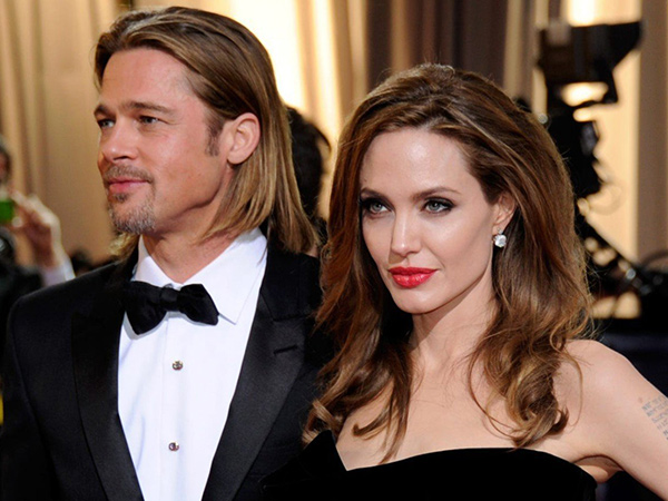 Naik Motor, Brad Pitt Kepergok Datangi Rumah Angelina Jolie