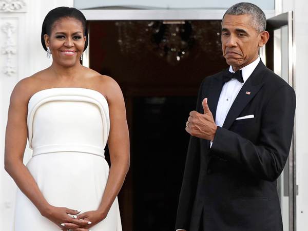Begini Reaksi Presiden Obama Saat Terpesona dengan Penampilan Anggun Sang Istri
