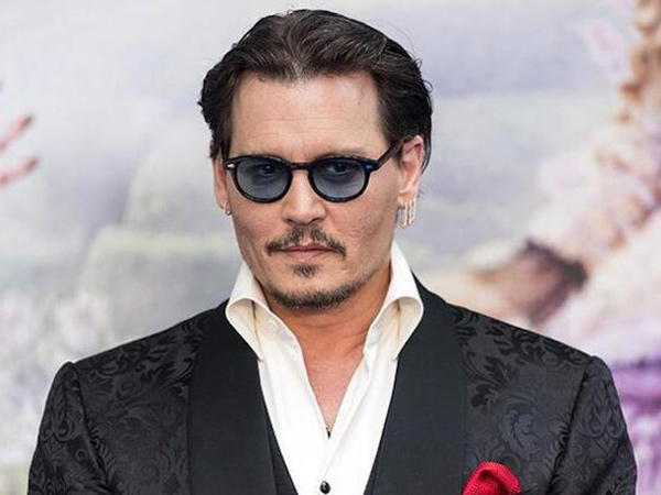 Gugat Media Inggris, Johnny Depp Dapat Pembelaan Mantan Kekasih