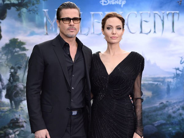 Gaya Serba Hitam Brad Pitt & Angelina Jolie di Premier 'Maleficent', Yes or No?