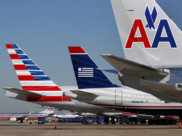 Duh, Puluhan Pesawat American Airlines Gagal Terbang Karena iPad!